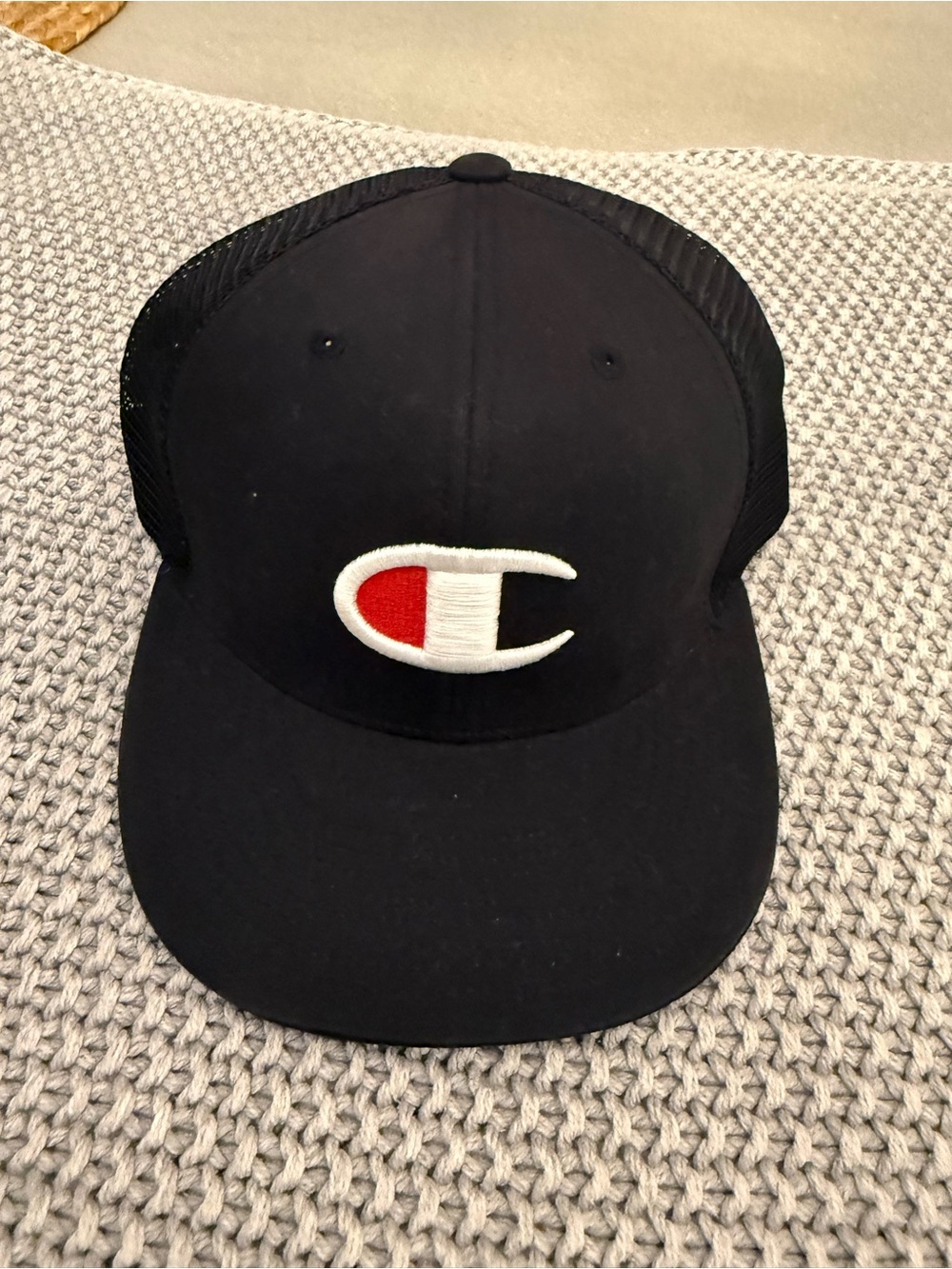 Champion  Black Trucker Hat with Red Accent